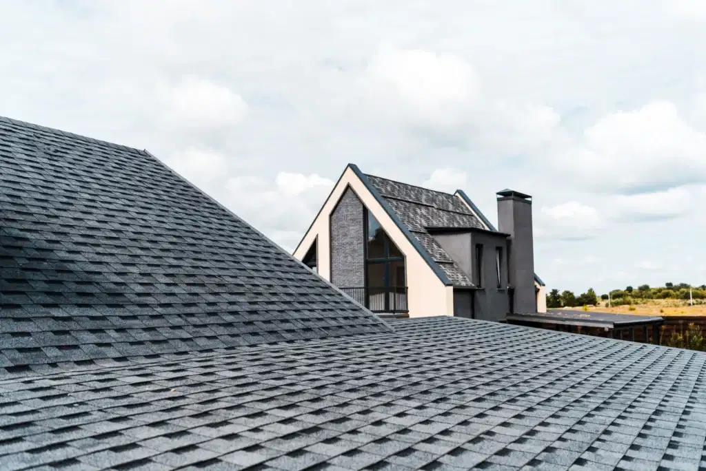 Modern home with asphalt shingle roof and natural light