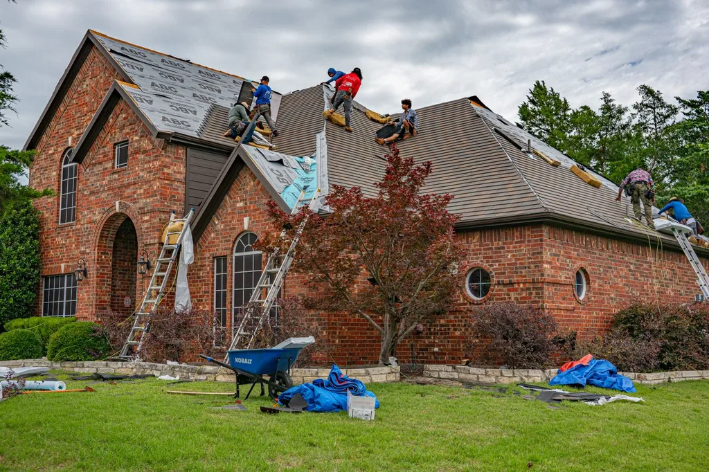 Full roof replacement underway with underlayment exposed across every slope